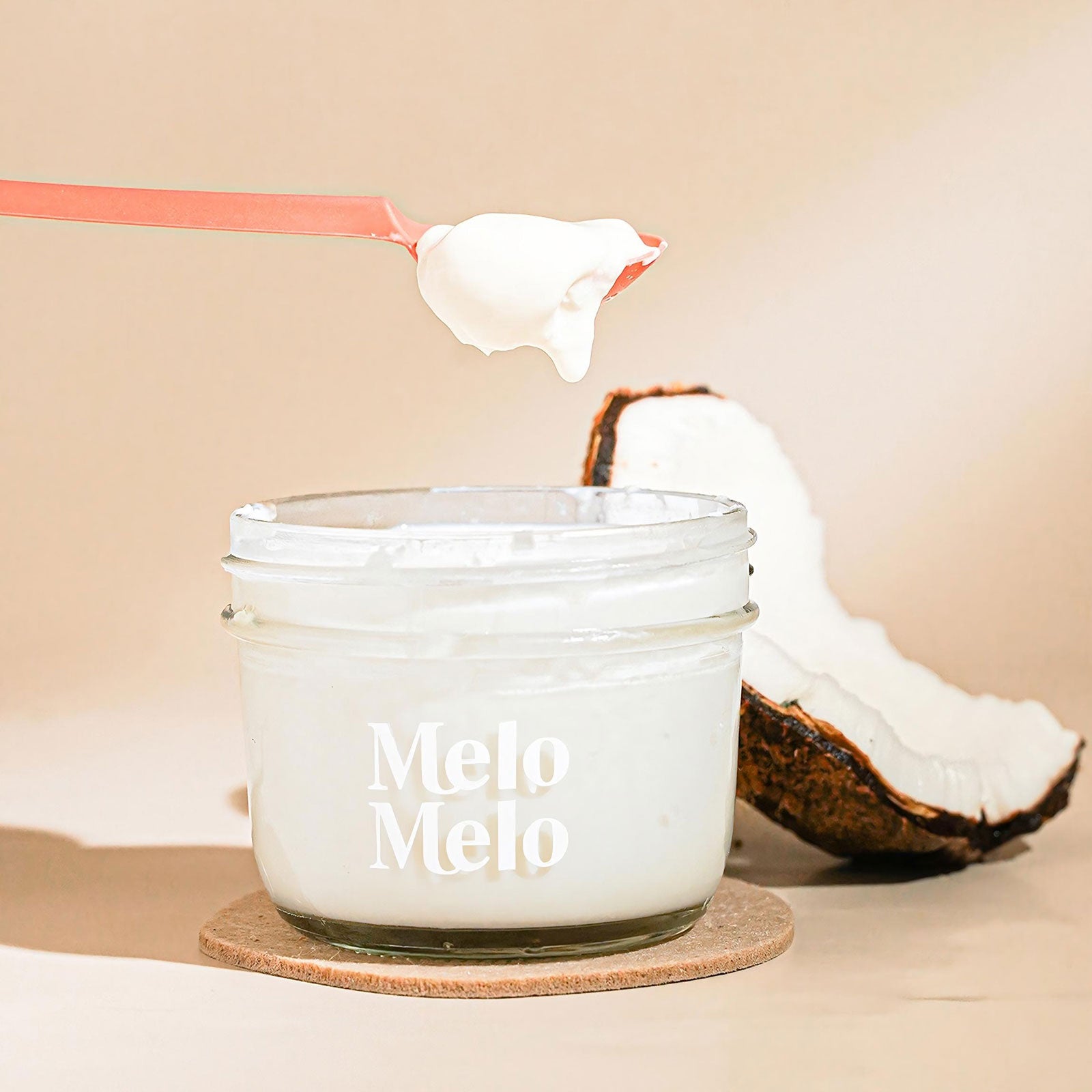 luxury coconut jelly dessert with milk and coconut water, silky texture, elegant glass cup, minimalist style, soft shadows, high-end food photography